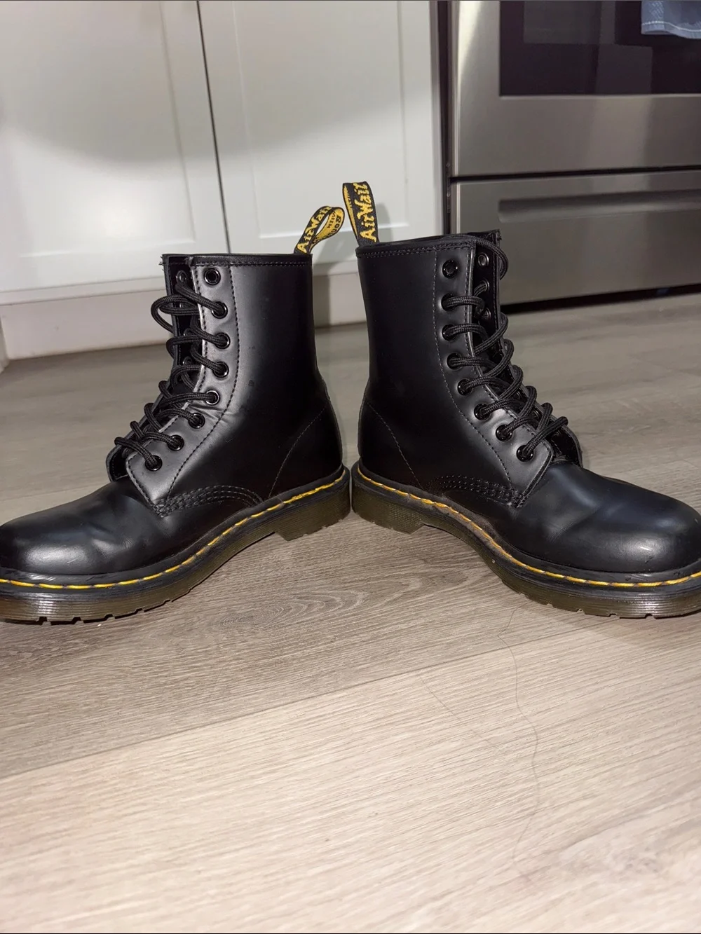 Dr. Martens Black Leather 8-Eye Lace-Up Boots with Yellow Stitching